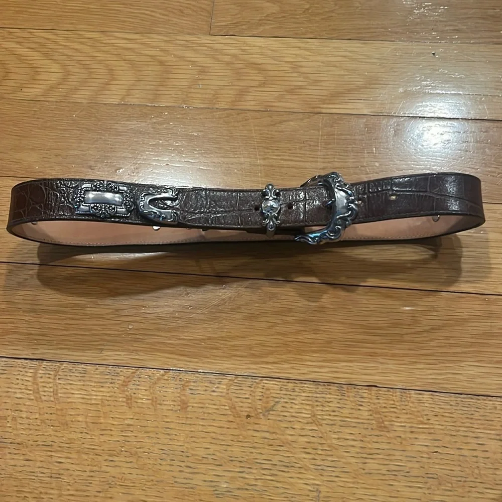 Brighton 1993 dark brown textured silver medallion accents belt size medium.